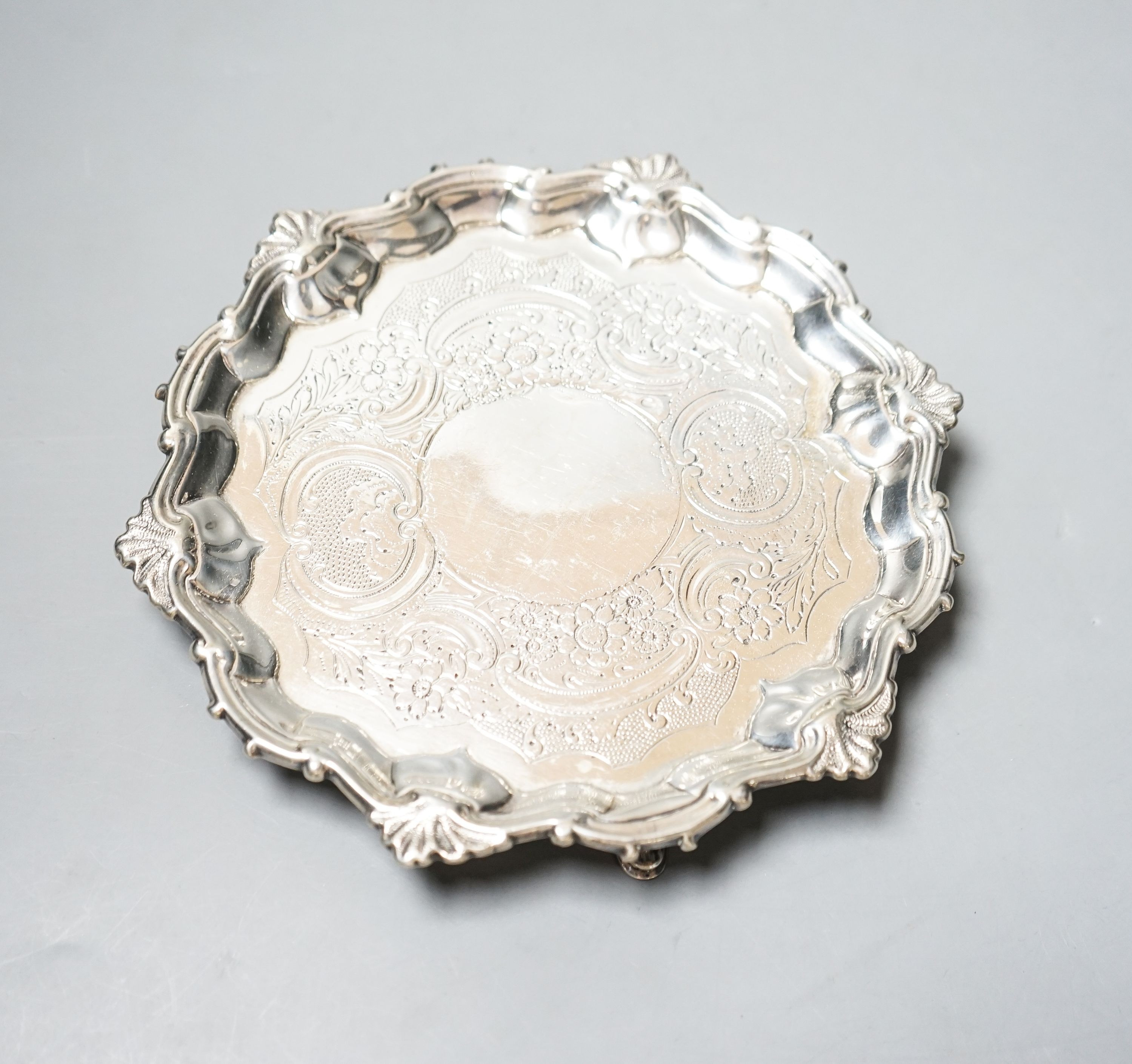 A George II silver waiter, with later engraved decoration, William Grundy, London, 1751, 18.6cm, 8oz (a.f.).
